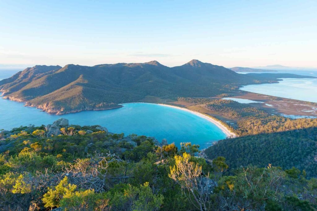 Image shows a panoramic shot of islands and sea landscape on a Tasmania group tour.