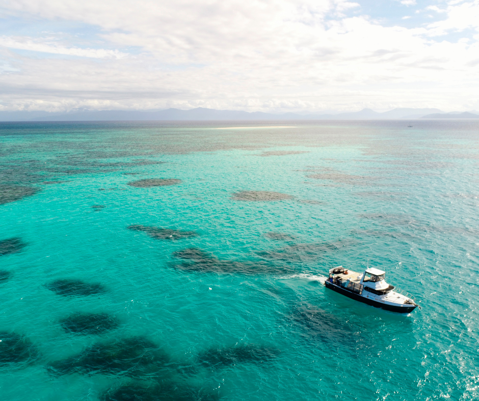 Image of a boat on the water on the Great Barrier Reef.