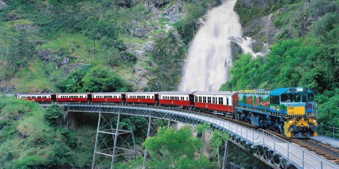 The Kuranda Scenic Railway. The train passes by a waterfall on the way to Kuranda
